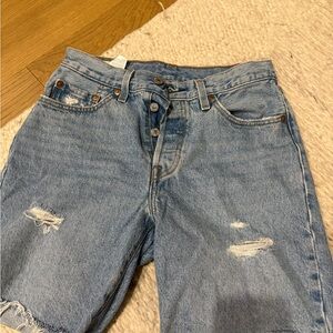 Levi’s mid thigh medium wash 501 Distressed Denim Shorts